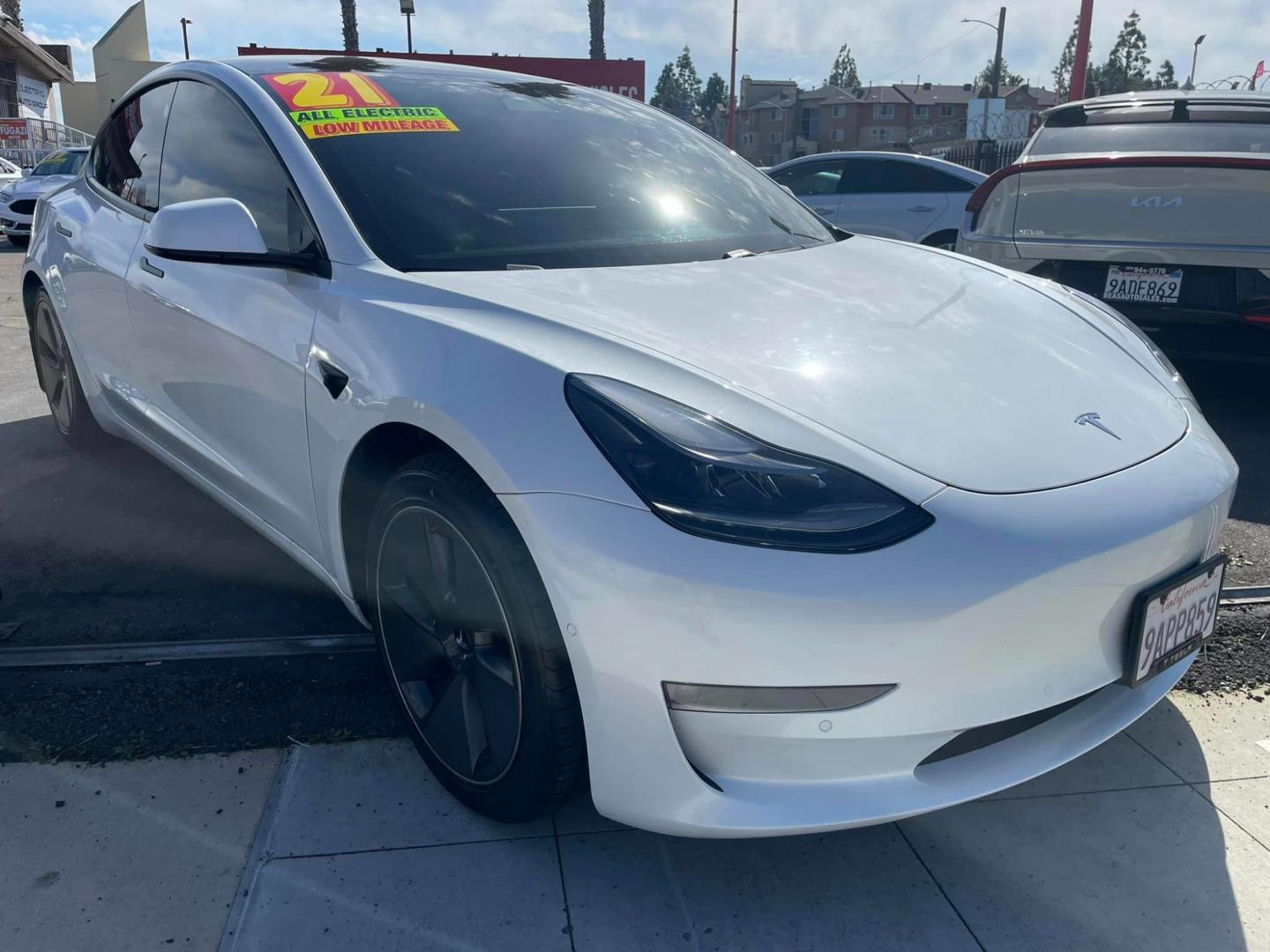 2021 WHITE /BLACK Tesla Model 3 Long Range (5YJ3E1EB8MF) with an ELECTRIC engine, 1A transmission, located at 744 E Miner Ave, Stockton, CA, 95202, (209) 944-5770, 37.956863, -121.282082 - Photo#1